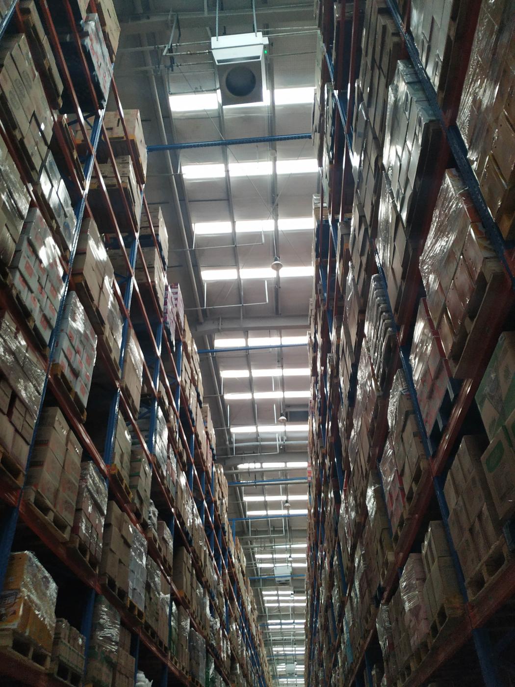 Heat loss in a high-bay warehouse — the volume of air under the roof drives the heating load